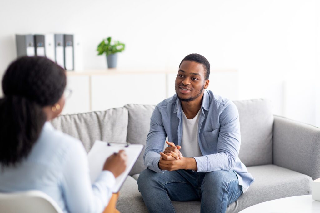 Image of a young male talking to his behavioral  in Las Vegas, NMtherapist