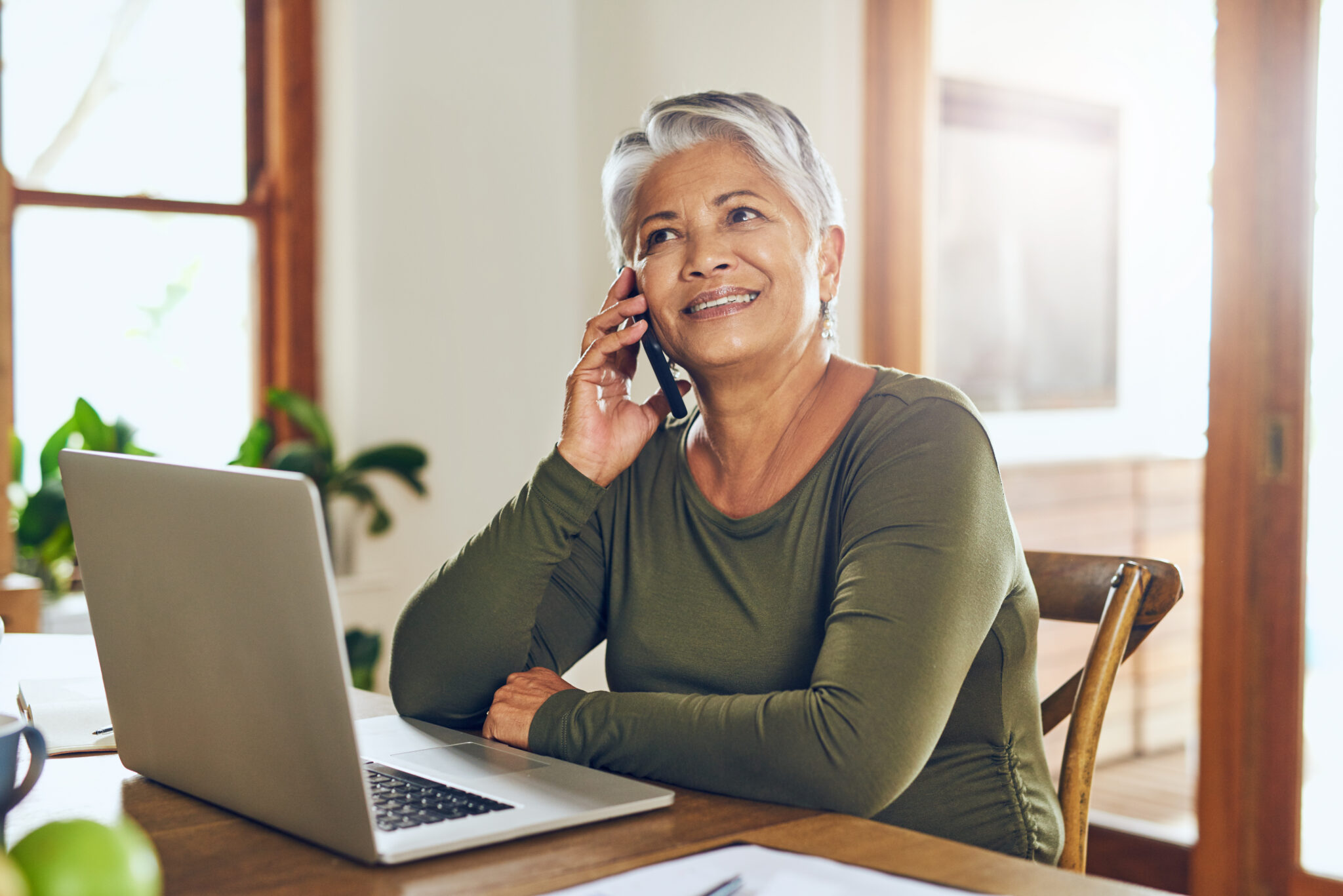 Image of an elderly woman scheduling her telemedicine appointment in Raton NM